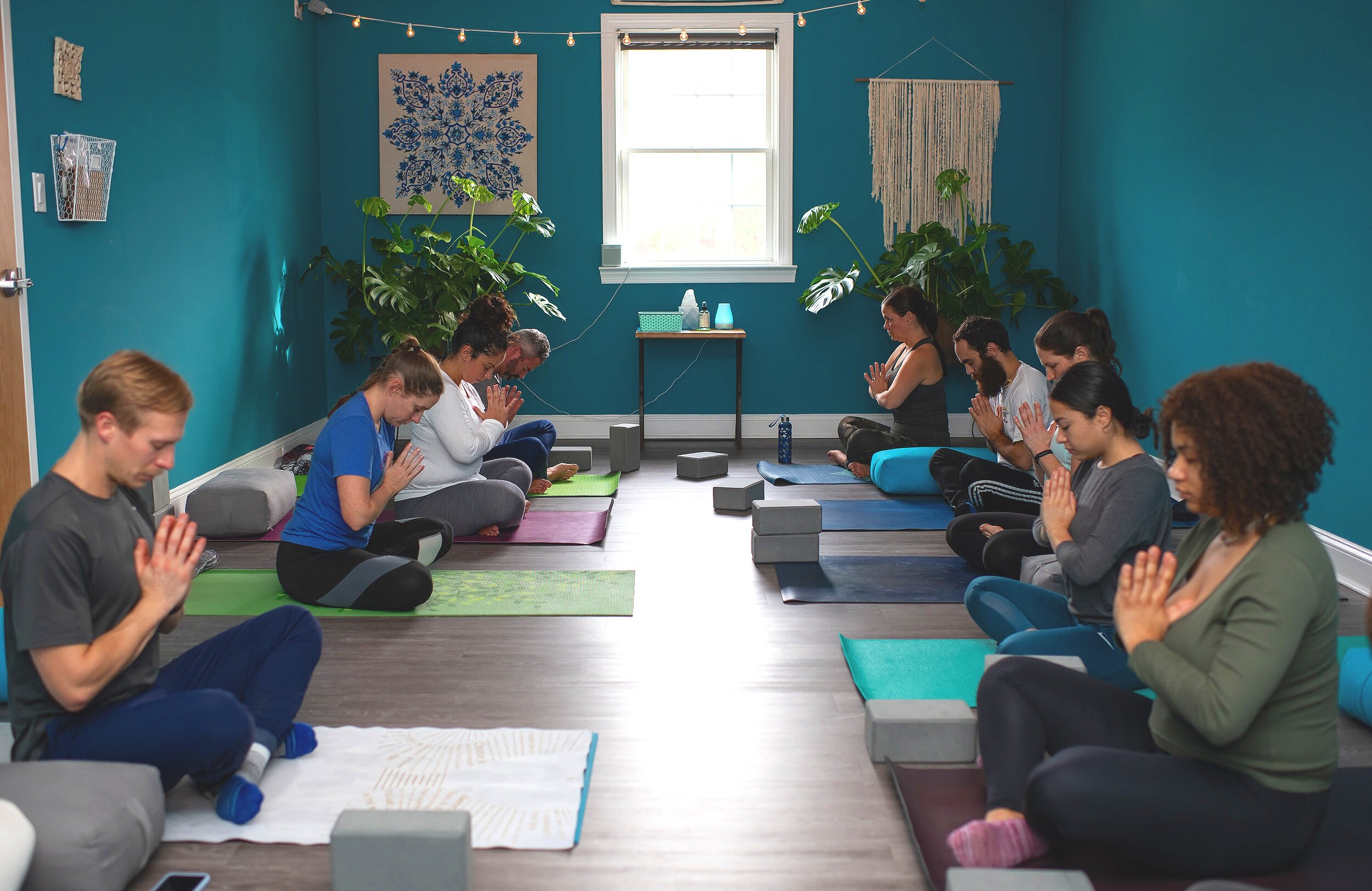 Group of people doing meditation