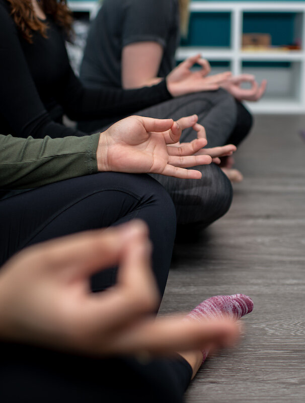 Here’s Where to Start if You’re Looking for Trauma-Informed Yoga