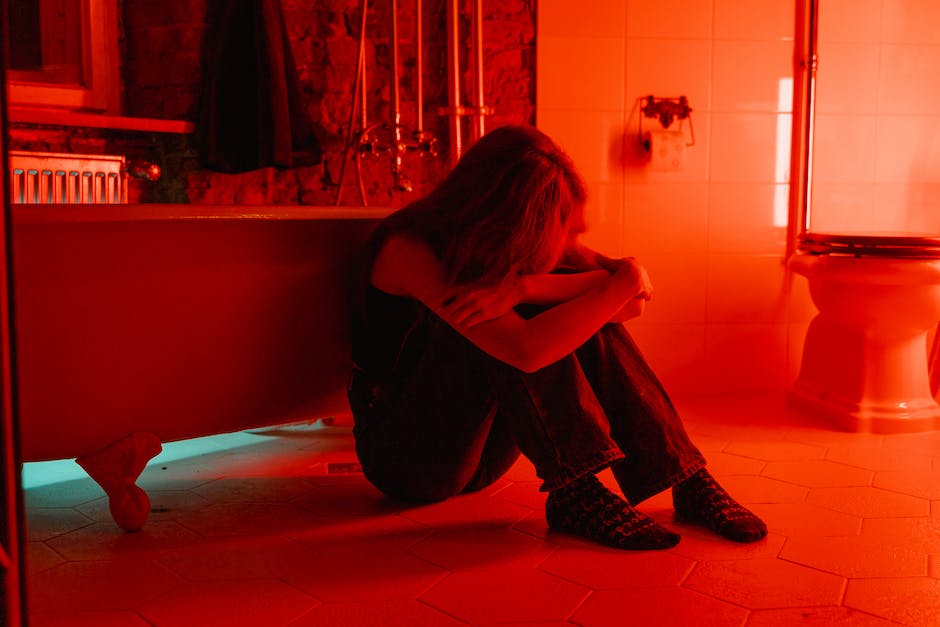 woman in a red light room