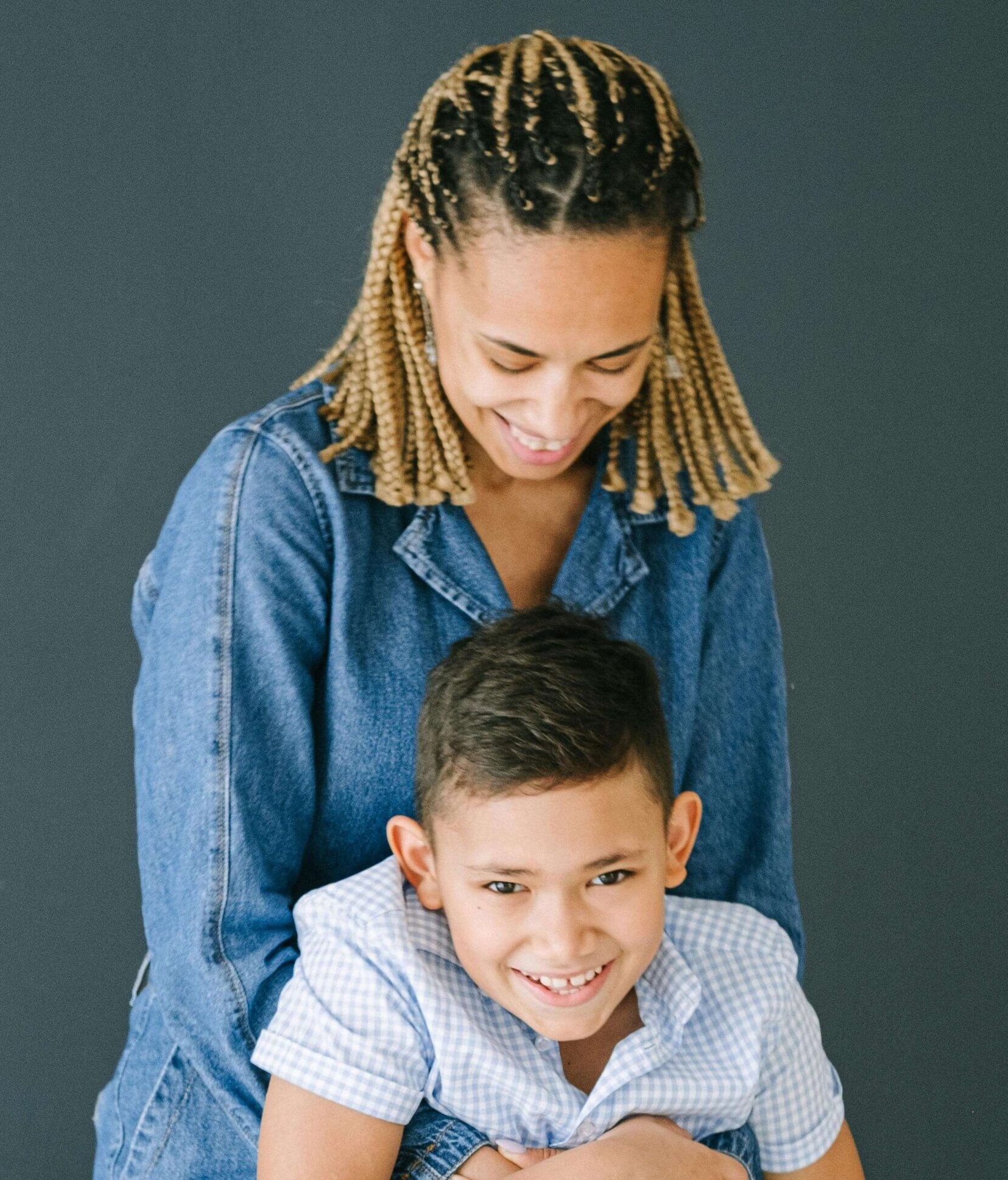 Happy mom hugging her young son. See your child begin to thrive and heal from their uncontrollable emotions and behaviors with the help of therapy for children in South Jersey.