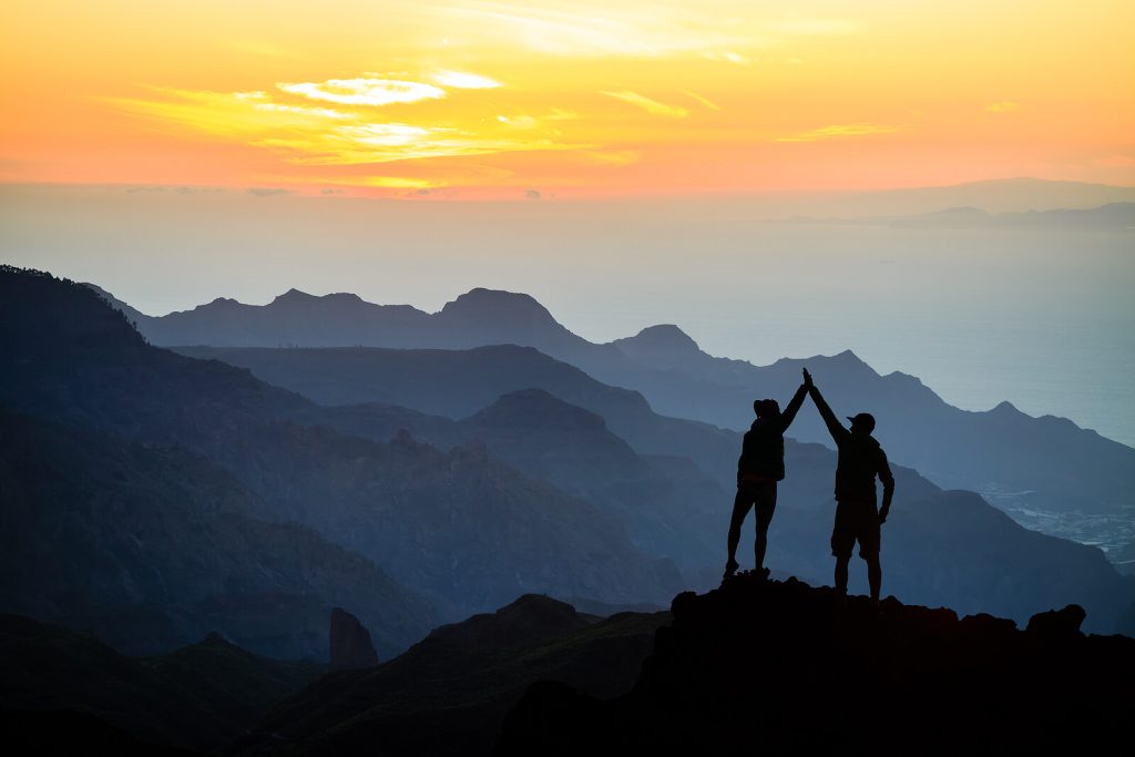 Teamwork and a high five. Healing from Trauma is possible with with Accelerated Resolution Therapy in South Jersey. Find Trauma healing with ART here